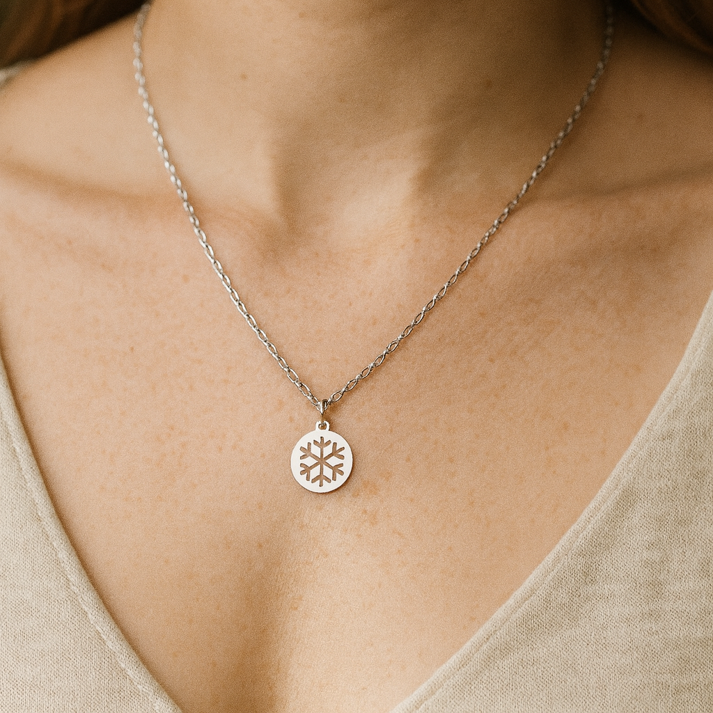 Necklace with a circular pendant worn by a person